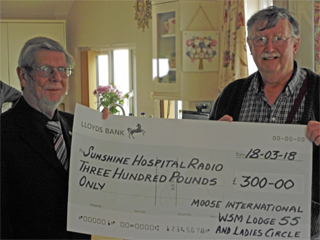 Alan Flower from Moose International, Weston-super-Mare Lodge 55 & Ladies Circle, presents cheque to Dave Lloyd from SHR.